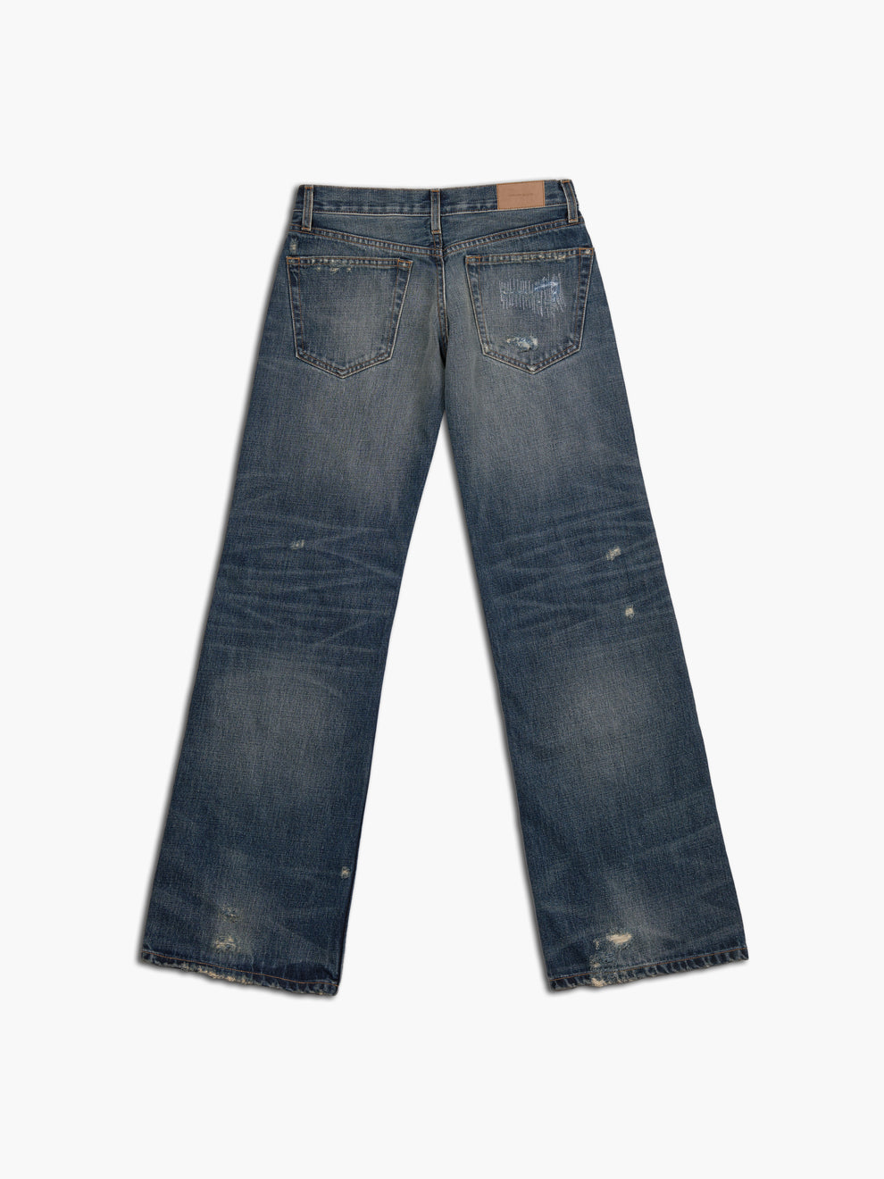 women's bootcut jean in destroyed indigo, back view