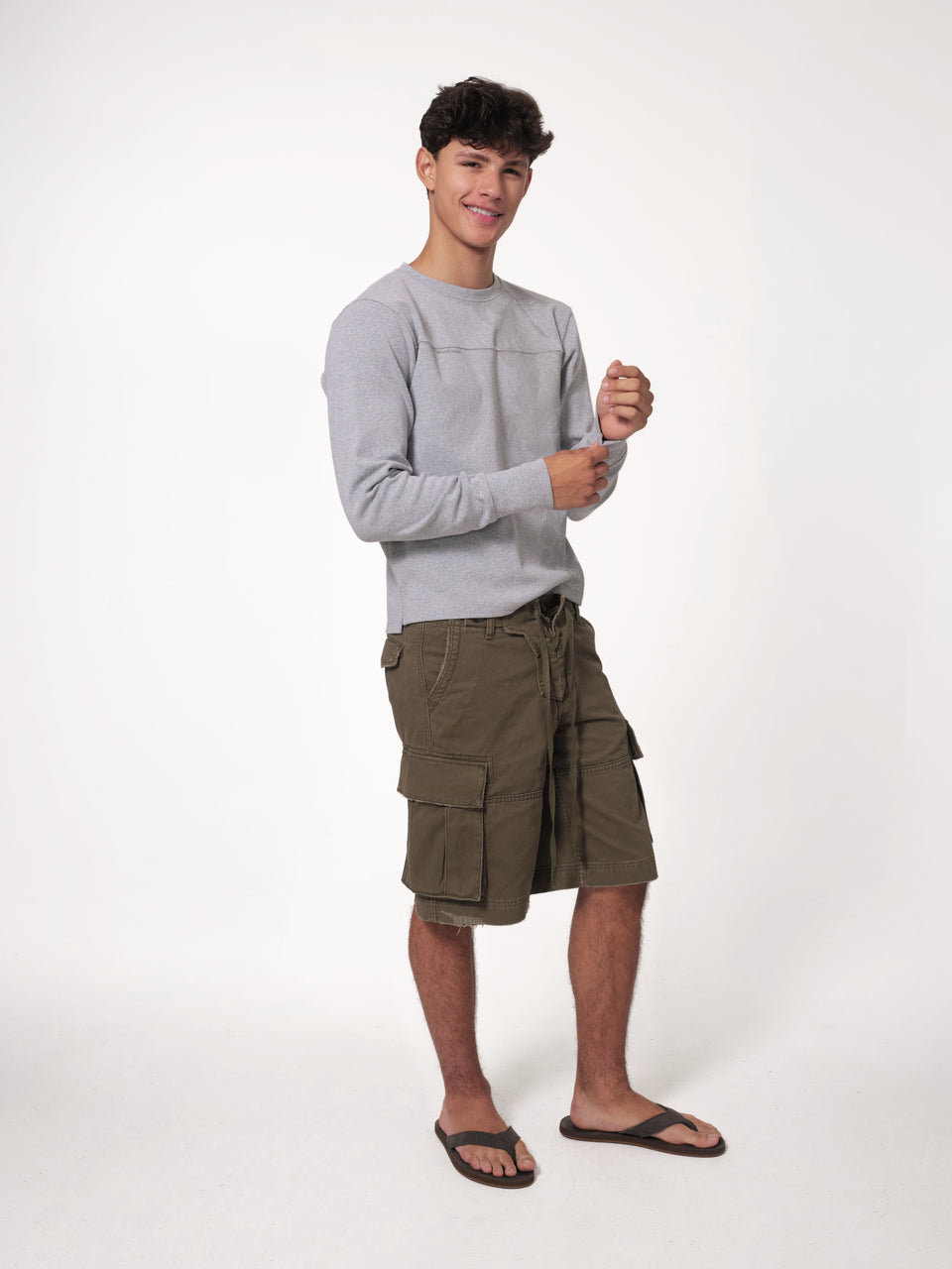 raimundo langlois LONG SLEEVE FOOTBALL TEE IN HEATHER GREY on Niko, smiling full-body view